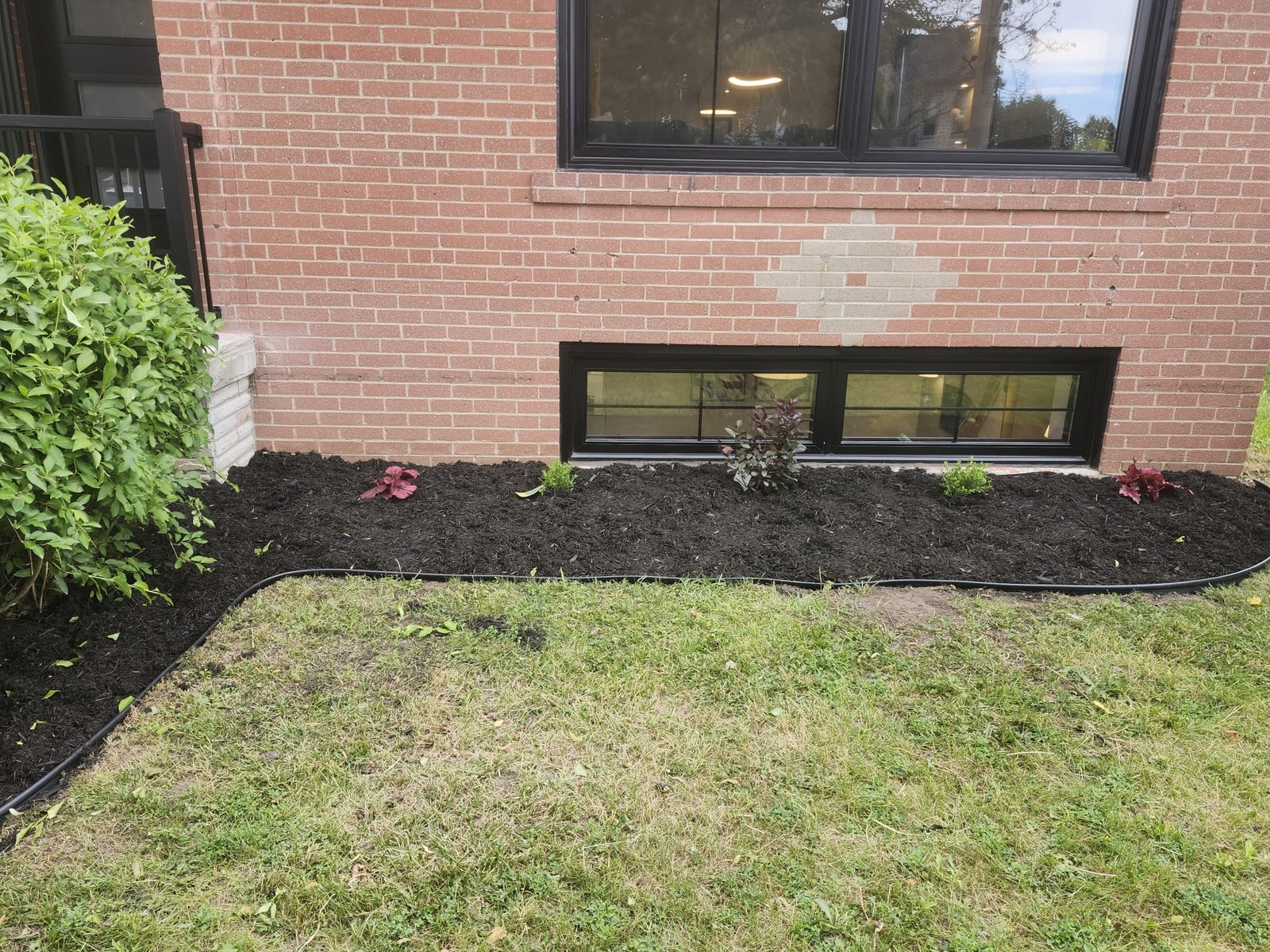 Fresh mulch and planting