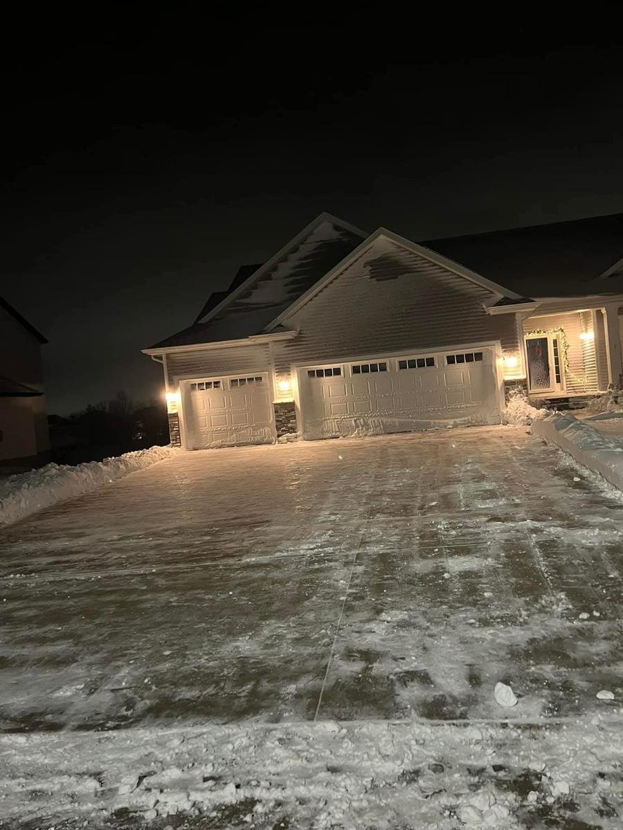 Large driveway cleared at night